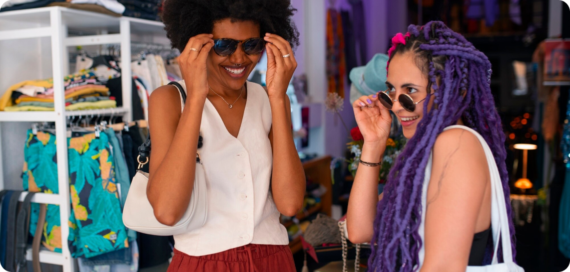 Two people smiling with sunglasses